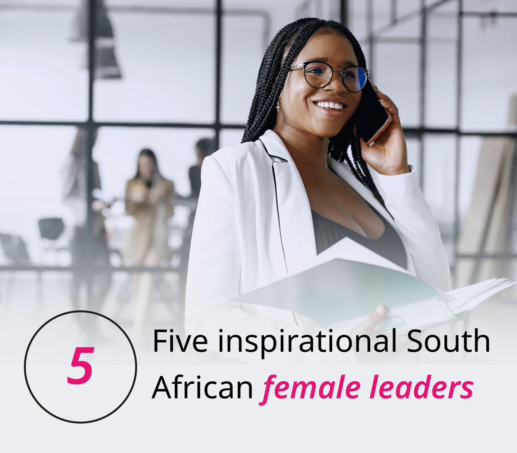A businesswoman speaking on a phone in the workplace. Five inspirational South African female leaders.